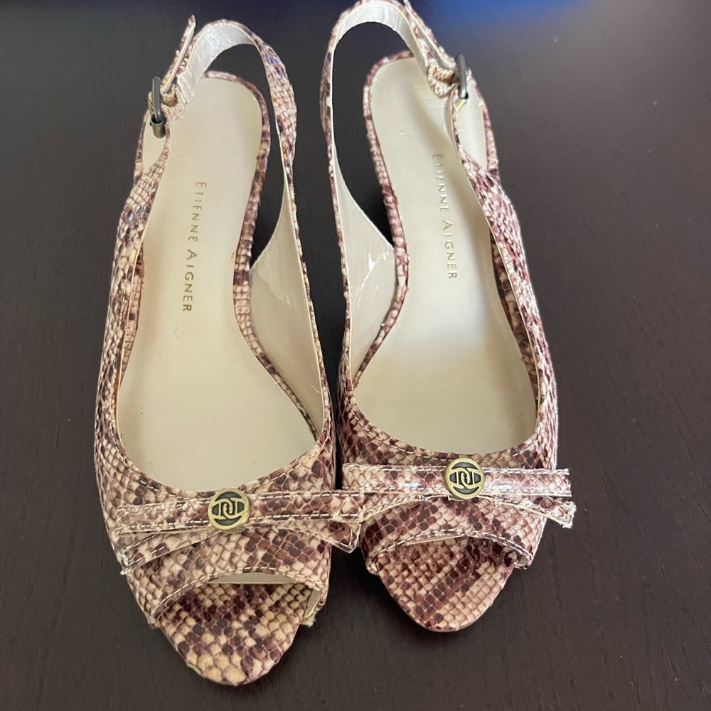 Etienne Aigner women’s 7 1/2M worn a couple of times. Strap in back, wedge heel